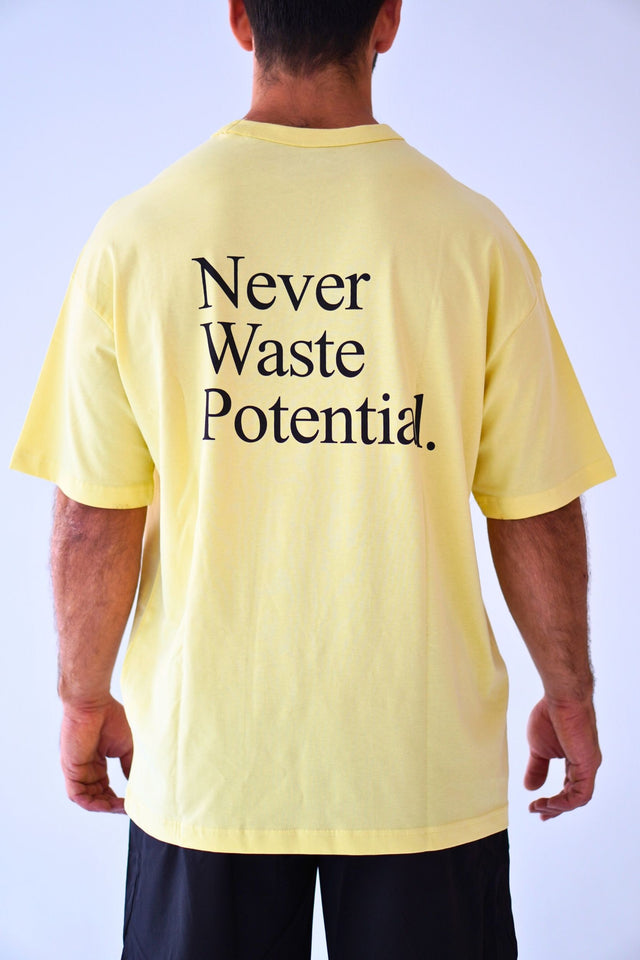 Camiseta Oversize Never Waste Potential Amarilla