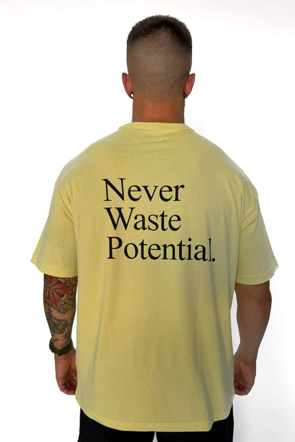 Camiseta Oversize Never Waste Potential Amarilla